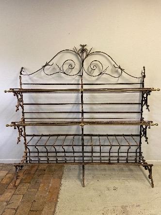 a french bread rack in iron