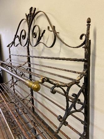 a french bread rack in iron