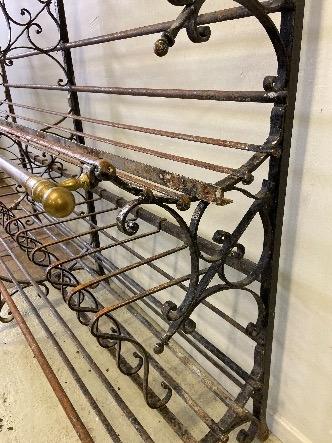 a french bread rack in iron