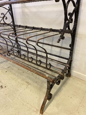 a french bread rack in iron