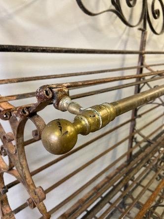 a french bread rack in iron