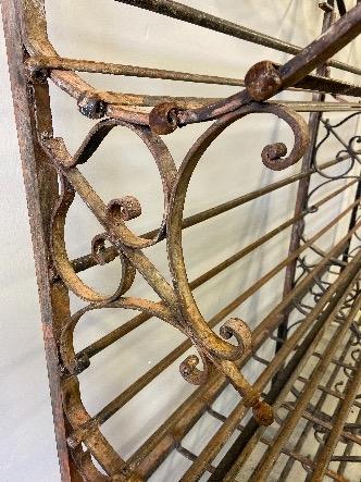 a french bread rack in iron