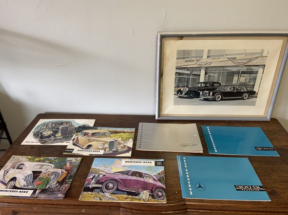 a lot of antique mercedes benz catalogues