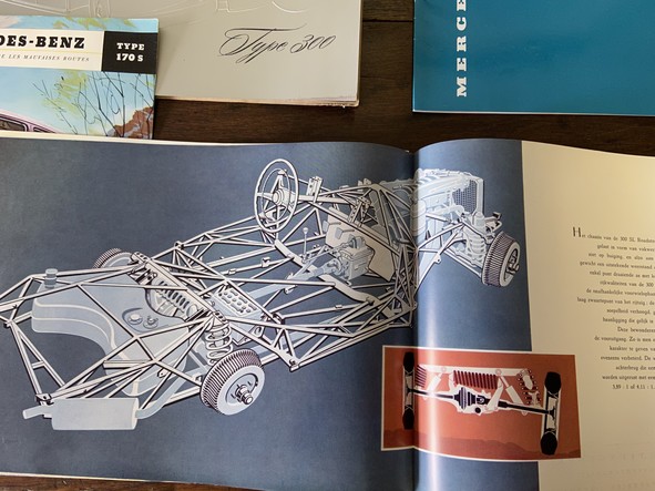 a lot of antique mercedes benz catalogues