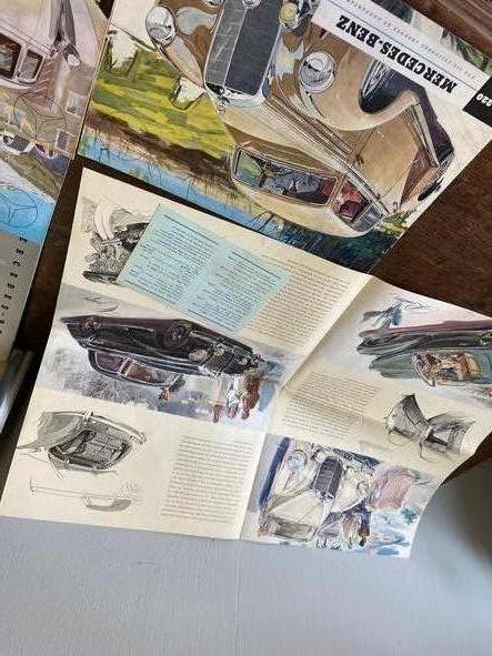 a lot of antique mercedes benz catalogues