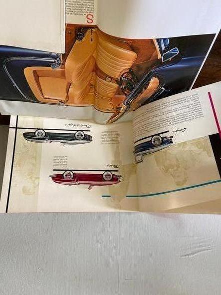 a lot of antique mercedes benz catalogues