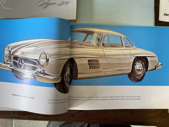 a lot of antique mercedes benz catalogues