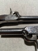 Pair of percussion pocket pistols, belgian mid 19th century
