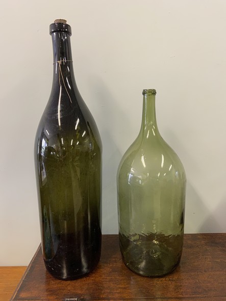 two large green bottles