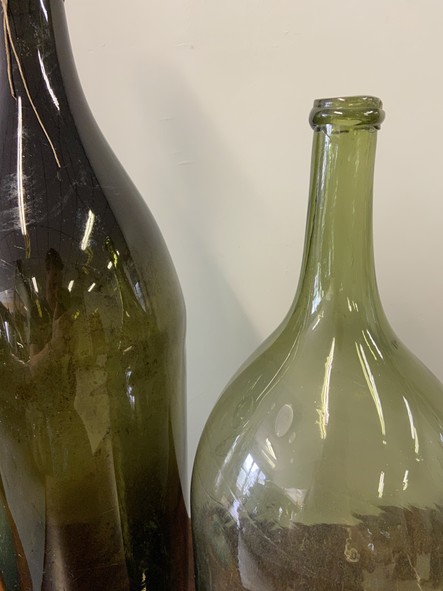 two large green bottles