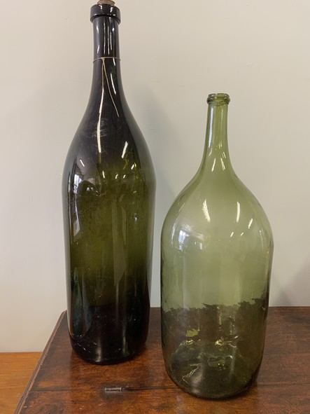 two large green bottles