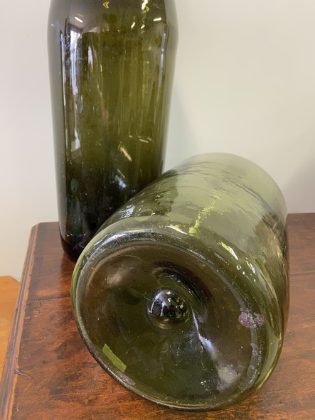 two large green bottles